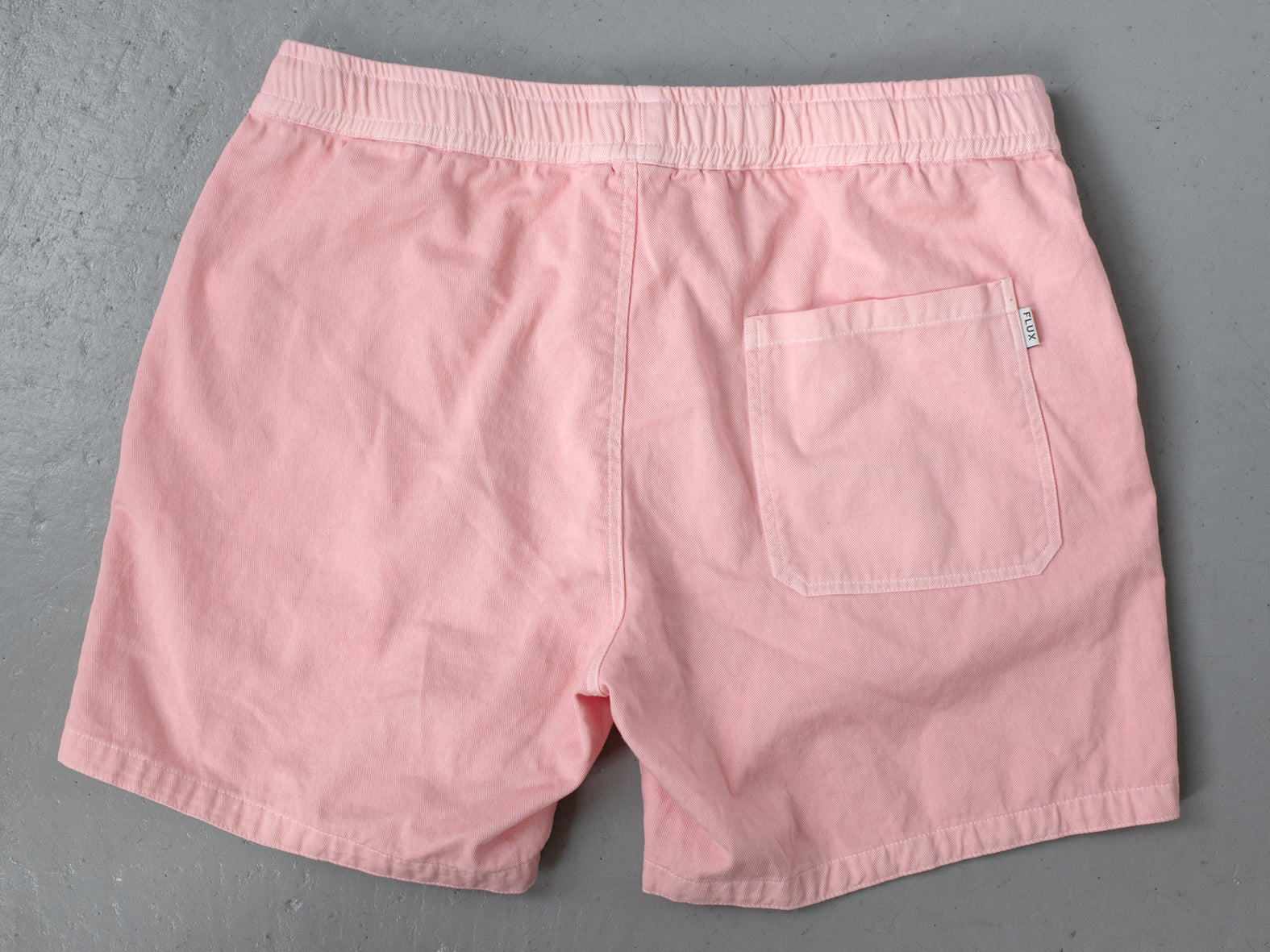 HIT THE CITY. EVERYDAY SHORTS. BLEACHED CORAL.